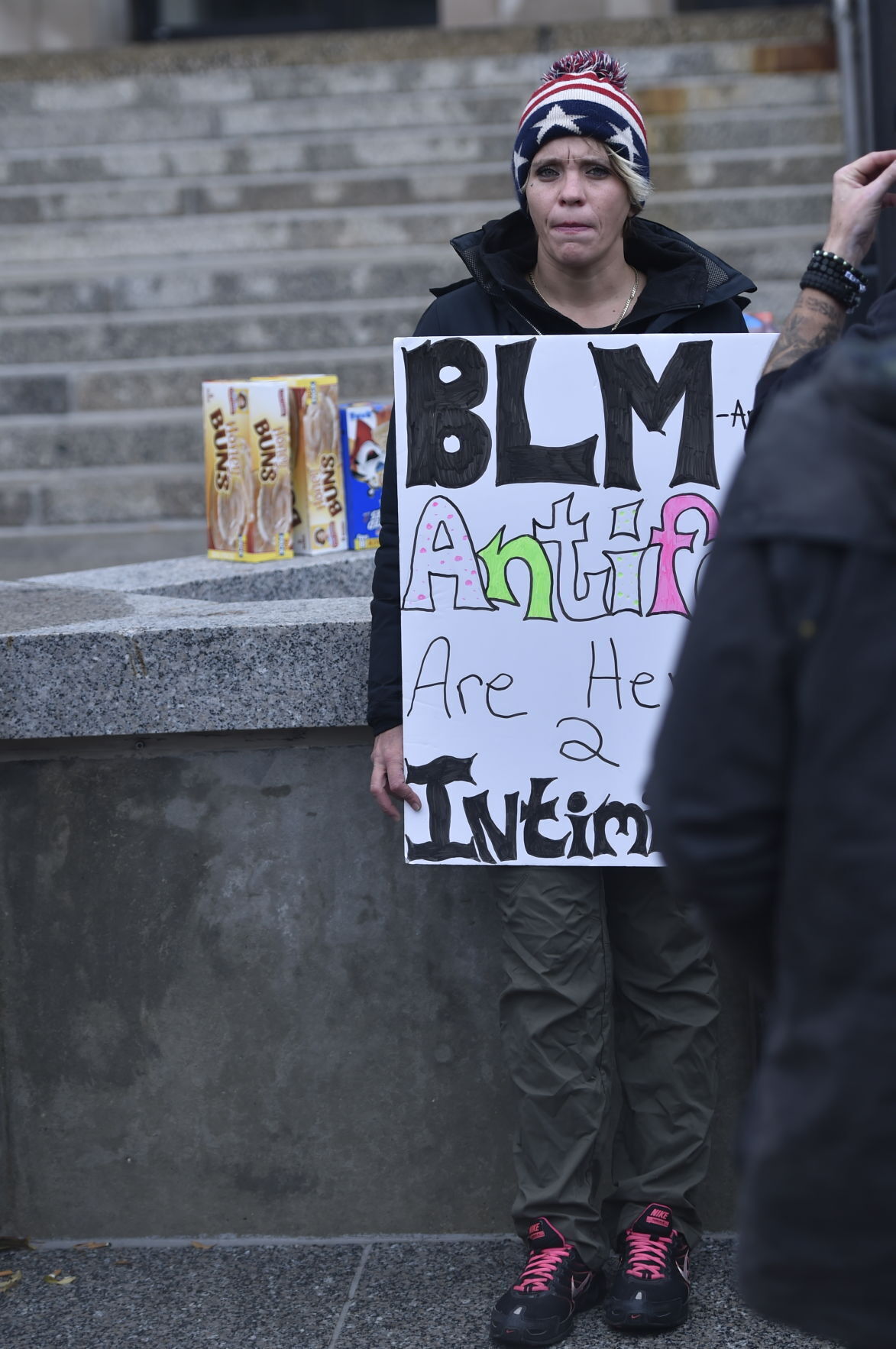Emily Cahill protests at courthouse